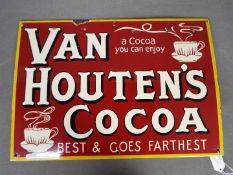A vintage enamel sign for Van Houten's Cocoa,