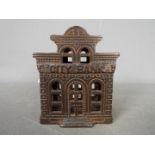 An early 20th century, John Harper, cast iron, money bank 'City Bank', approximately 10 cm (h).