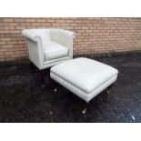 A good quality cream coloured tub chair and matching footstool.