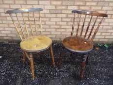 Two good quality stickback dining chairs with turned supports.