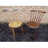 Two good quality stickback dining chairs with turned supports.