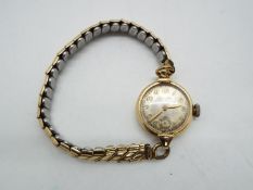 Longines - a 9ct gold Longines wristwatch with expanding bracelet marked Montal