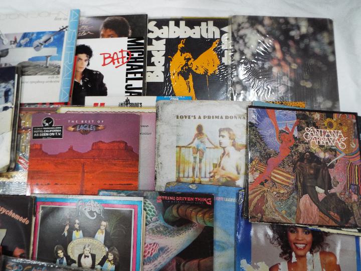 A collection of vinyl records, 12" and 7" to include Black Sabbath, Michael Jackson, Blondie, - Image 2 of 6