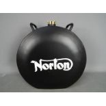 A black Norton petrol can