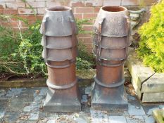 Two glazed louvre vented chimney pots,