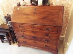 A good quality fall front bureau with graduated drawers and fitted interior,
