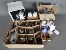 Unused Retail Stock - Mixed lot containing Christmas items; nine glass tea lights,
