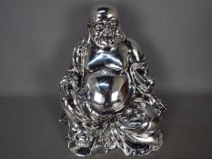 Retail Stock - Silver effect sitting Budha NANO13 approximately height 28 cm contained in outer box.