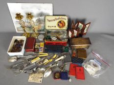A mixed lot of collectables to include cigarette cards, coins, flatware (some with silver mounts),