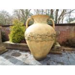 Garden decor - a large metallic twin-handled urn,