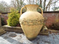 Garden decor - a large metallic twin-handled urn,