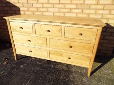 A good quality, light oak, sideboard by J. B.