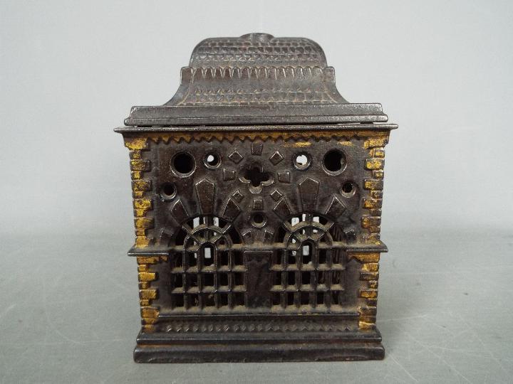 A Victorian cast iron money bank of architectural form, depicting a bank, approximately 12. - Image 4 of 5