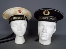 Two Russian Navy caps / hats, each with tally.