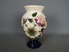 Moorcroft - a Moorcroft vase in the Bramble Revisited design,