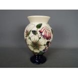 Moorcroft - a Moorcroft vase in the Bramble Revisited design,