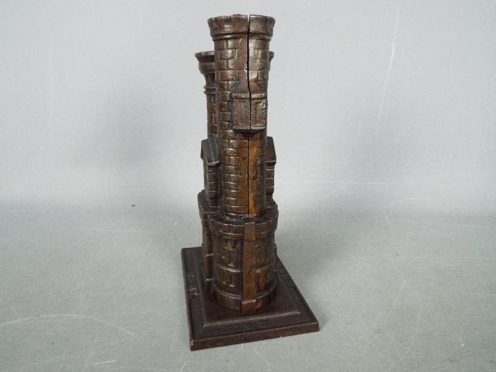 A cast iron, novelty money bank in the form of a castle, marked to the plinth 'Bank', - Image 4 of 6