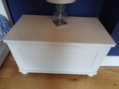 A white linen chest.