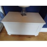 A white linen chest.