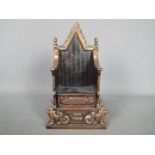 A cast iron John Harper money bank in the form of a throne for the Coronation of Queen Elizabeth II,