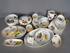 Royal Worcester - A collection of Royal Worcester 'Evesham' tableware, approximately 30 pieces.