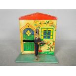 A novelty tinplate, Burnett Postman,