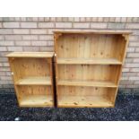 Two freestanding pine bookcases, largest approximately 97 cm x 80 cm x 22 cm.