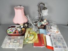 Lot to include sewing and crafting equipment and a quantity of lamps.