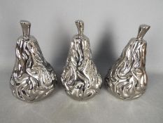 Unused Retail Stock - Three boxed ceramic pears with metallic, silver coloured finish,