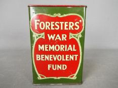 A vintage charity collection tin for the Ancient Order of Foresters, approximately 14 cm (h).