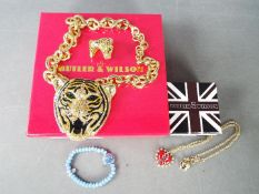 Butler & Wilson - a large Butler & Wilson necklace with stone set pendant in the form of a tiger's