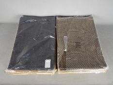 Unused Retail Stock - Two boxes containing unused placemats,