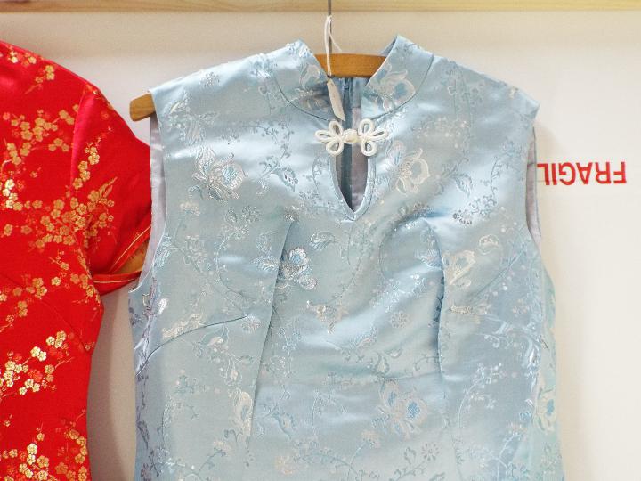 Two Chinese cheongsam type dresses, one in light blue with silver coloured thread, - Image 3 of 4