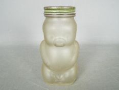 A vintage sweet jar money bank by Allens Sweets in the form of a pig, approximately 13 cm (h).