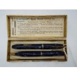 Conway Stewart - A vintage blue marble writing set comprising a Dinkie 550 with 14ct nib and pencil