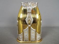 A limited edition, Yossi Swed, brass and silver Judaica Tzedakah (charity box),