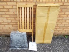 Unused Retail Stock - A box of two oak 'Manhattan' chairs by International Furniture UK Ltd.