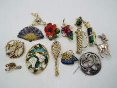 Brooches - fourteen brooches to include a hallmarked silver brooch, enamelled, stone set,