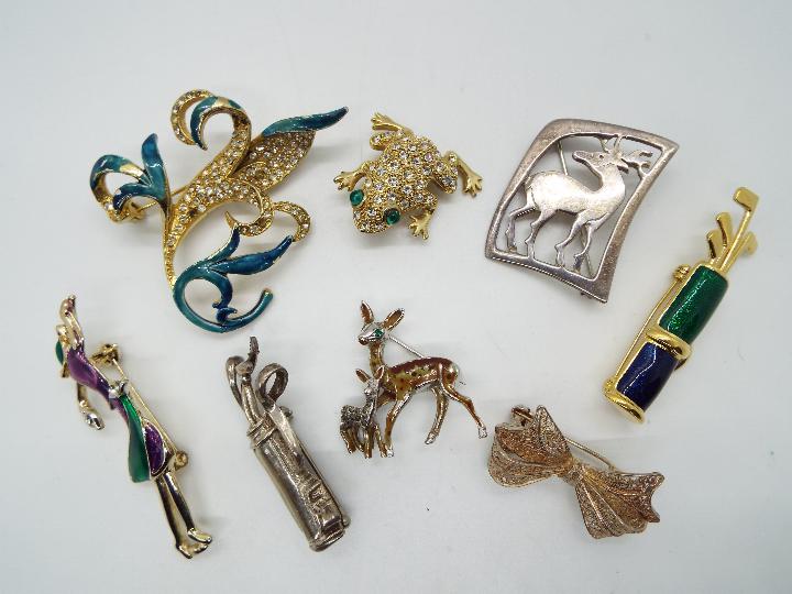 Brooches - eight brooches to include three Silver brooches, enamelled,