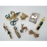 Brooches - eight brooches to include three Silver brooches, enamelled,