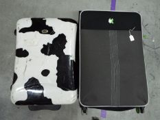 Withdrawn - Two pieces of travel luggage.