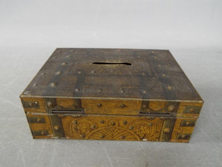 A vintage money bank / tin in the form of a metal bound chest, - Image 3 of 4
