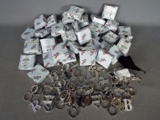 Unused Retail Stock - In excess of 60 Border Fine Arts 'Silver Glitter' Letter keyrings,