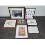 A collection of framed prints and pictures, varying image sizes.