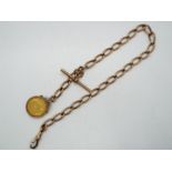 Numismatology - a Hallmarked 9 ct gold watch chain with T bar and mounted 1907 gold sovereign,