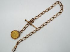 Numismatology - a Hallmarked 9 ct gold watch chain with T bar and mounted 1907 gold sovereign,