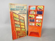 A 1960's Peter Pan Playthings Ltd 'Self Service Sweet Machine' savings bank,