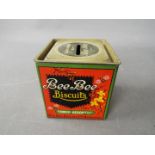 An unusual Bee Bee Biscuits tin money bank,