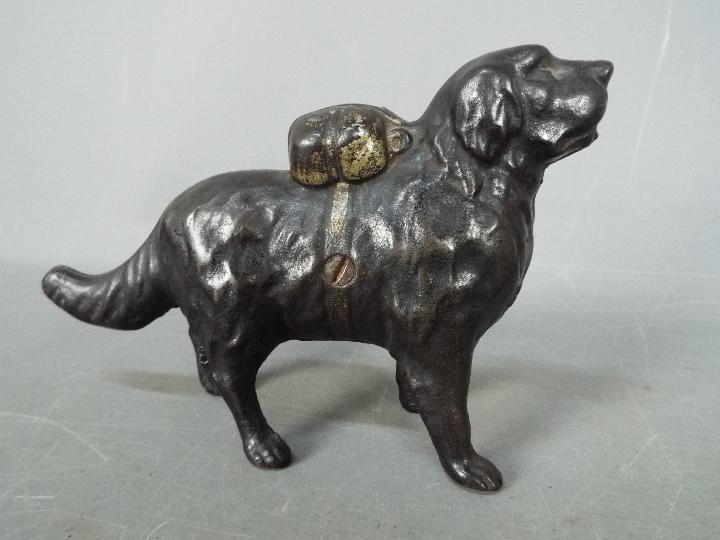 A cast iron money bank in the form of a St Bernard dog, - Image 2 of 8