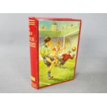 A Chad Valley novelty tinplate money box in the form of a book,
